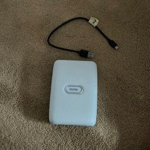 Polaroid printer with charging cord